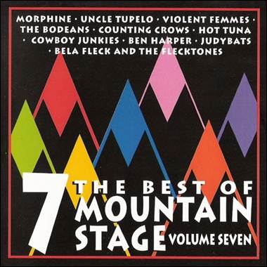 A cd cover with mountains and text

Description automatically generated