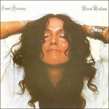 A person with her eyes closed

Description automatically generated