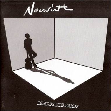 A person standing in a corner of a room
Description automatically generated