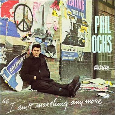 A person sitting on the ground
Description automatically generated