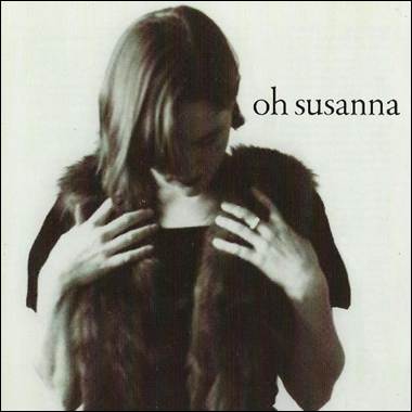 A person with her hands on her chest
Description automatically generated