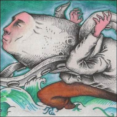 A person holding an octopus
Description automatically generated