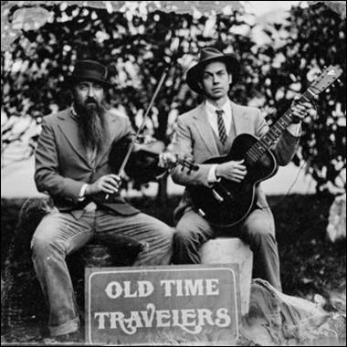 A couple of men playing instruments
Description automatically generated