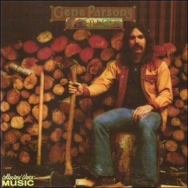 A person sitting on a log with an ax
Description automatically generated