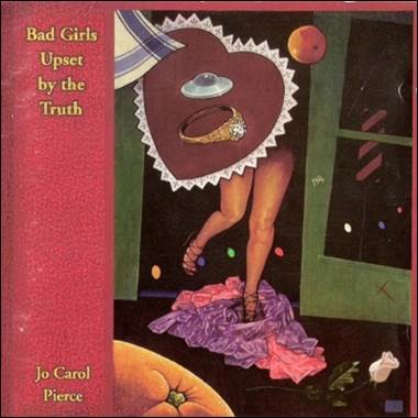 A book cover with a heart and a ring
Description automatically generated