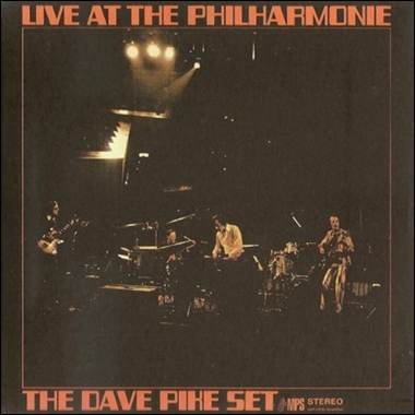 A band playing on a stage

Description automatically generated