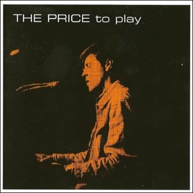 A person sitting in front of a microphone
Description automatically generated