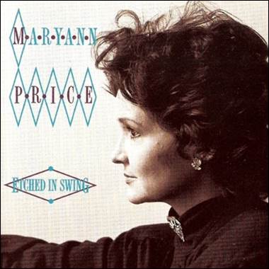 A person with dark hair and diamond earrings
Description automatically generated