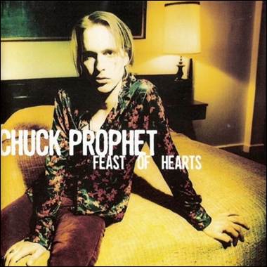 A person sitting on a bed
Description automatically generated