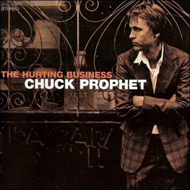 A person standing in front of a gate
Description automatically generated