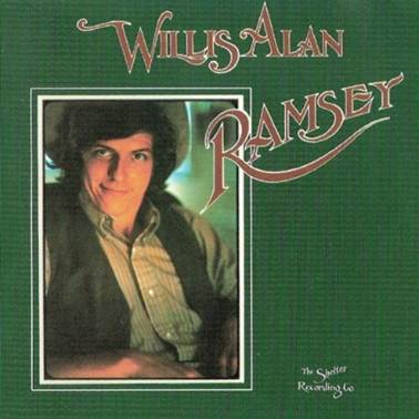 A person in a hat and vest
Description automatically generated