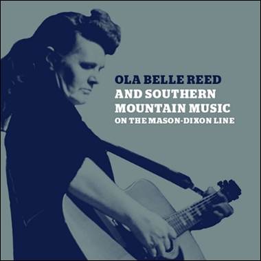 A person playing a guitar
Description automatically generated