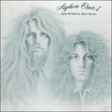 A group of men with long hair

Description automatically generated