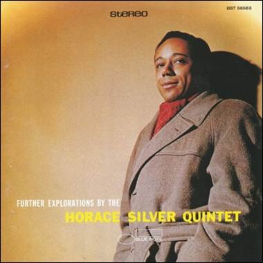 A person in a suit
Description automatically generated