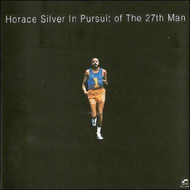 A person running on a black cover
Description automatically generated