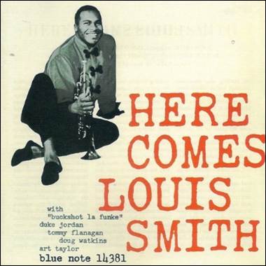 A person holding a trumpet

Description automatically generated