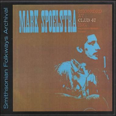 A person with a microphone on a cd cover
Description automatically generated