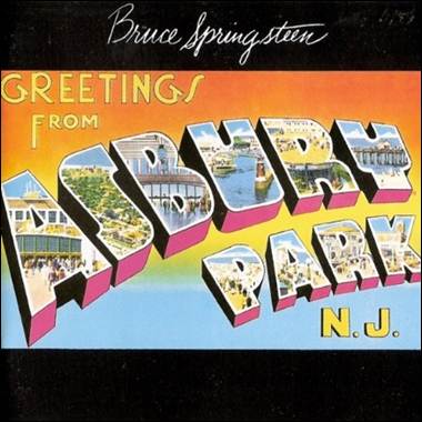 A postcard with colorful letters

Description automatically generated