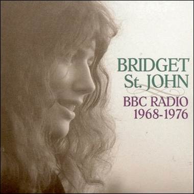 A person with long curly hair
Description automatically generated