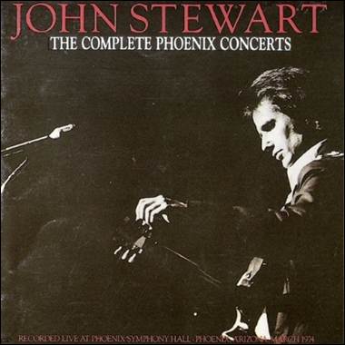 A person holding a microphone
Description automatically generated