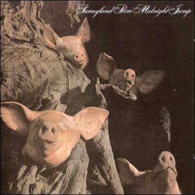 A group of pigs with ears
Description automatically generated