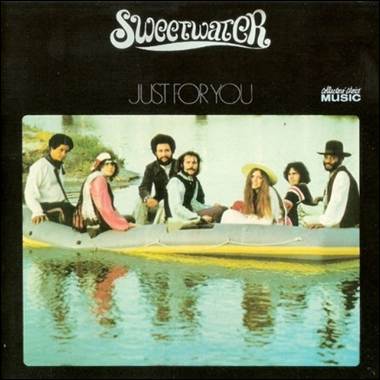 A group of people in a boat
Description automatically generated