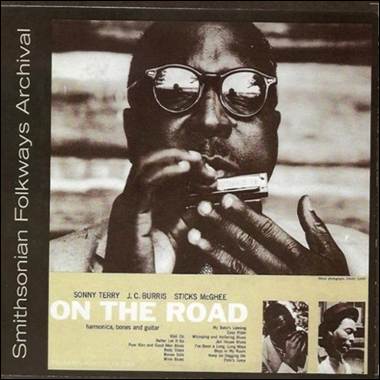 A person holding a harmonica

Description automatically generated