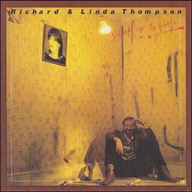 A person sitting on the floor
Description automatically generated