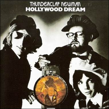 A group of men standing next to a clock
Description automatically generated