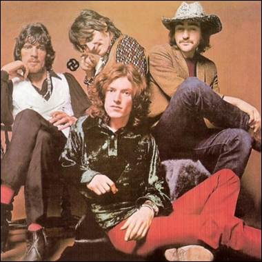 A group of men sitting together

Description automatically generated