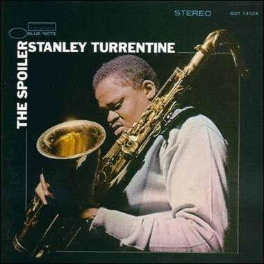 A person playing a saxophone
Description automatically generated