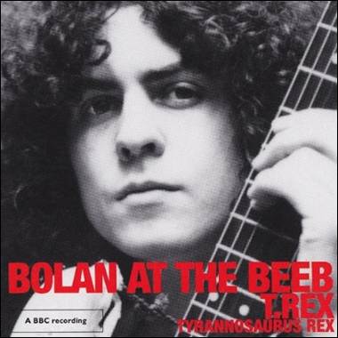 A person holding a guitar

Description automatically generated