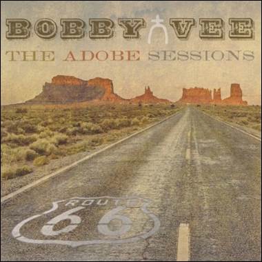 A road with a desert landscape

Description automatically generated