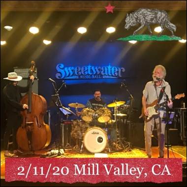 A group of people on a stage
Description automatically generated