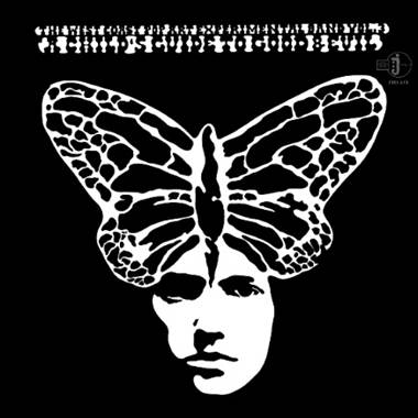 A person with a butterfly on his head
Description automatically generated