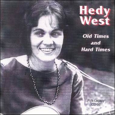 A person smiling with a guitar

Description automatically generated