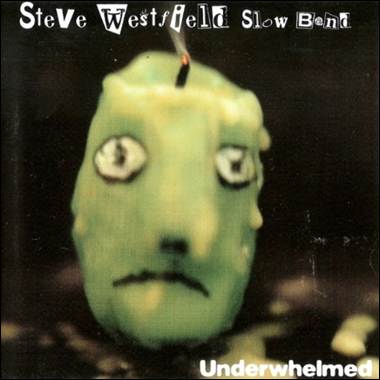 A candle with a face on it
Description automatically generated