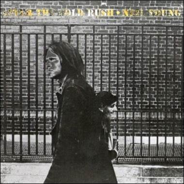 A person walking in front of a fence

Description automatically generated