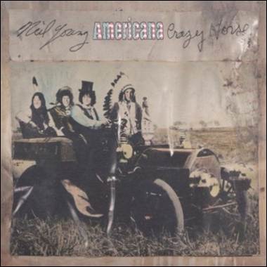 A group of people on a car

Description automatically generated