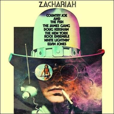 A person wearing a hat and sunglasses
Description automatically generated