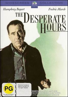 A person standing in front of a book cover

Description automatically generated