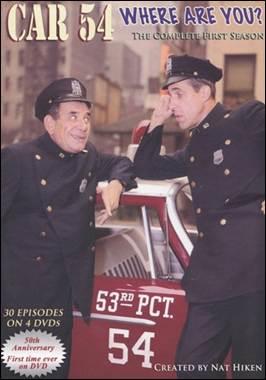 A person in uniform leaning on a car

Description automatically generated