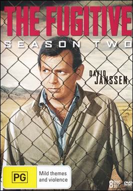 A person in a brown jacket behind a fence

Description automatically generated