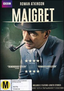 A person in a suit and hat smoking a pipe

Description automatically generated