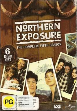 A dvd case with a group of photos

Description automatically generated