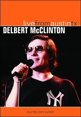 A person holding a microphone

Description automatically generated