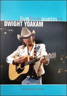 A person in cowboy hat playing guitar
Description automatically generated