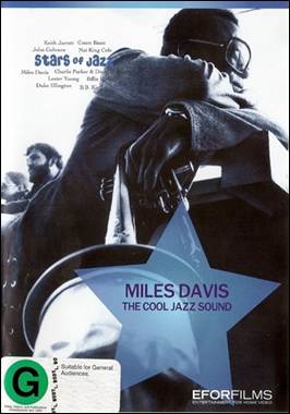 A person holding an object on a cover of a magazine
Description automatically generated