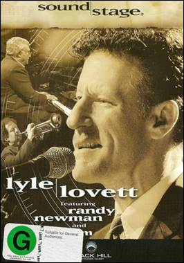 A person with a microphone and a person playing a saxophone
Description automatically generated