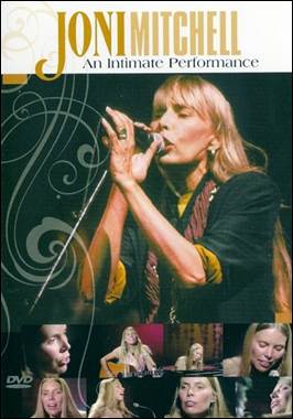 A person singing into a microphone
Description automatically generated